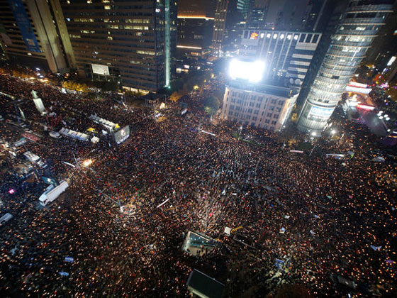 كل التفاصيل حول اكبر فضيحة فساد تهز كوريا الجنوبية والشارع يشتعل! صورة رقم 17