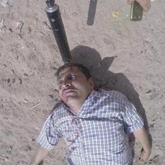  صور قاسية: ملثم داعشي يوثق جريمة قتل عقيد يمني صورة رقم 4