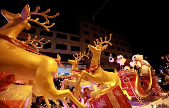  قافلة الميلاد تقتحم الحواجز في بيت لحم وفرحة العيد تعبر الى رام الله صورة رقم 15