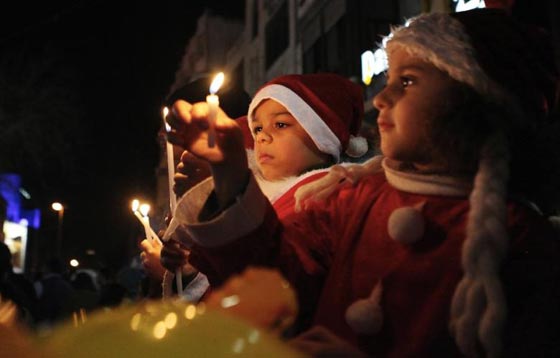  قافلة الميلاد تقتحم الحواجز في بيت لحم وفرحة العيد تعبر الى رام الله صورة رقم 20