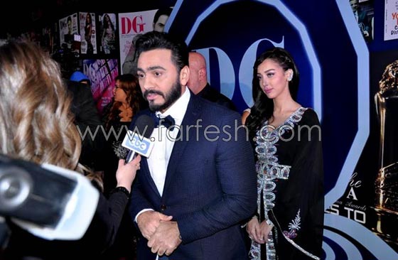 صور تامر حسني يغني لزوجته الشقراء الجميلة بسمة بوسيل متغزلا بها صورة رقم 4