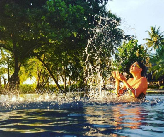   صور غادة عبد الرازق ترتدي بكيني وتتجاهل شائعة قيامها بعملية تجميل! صورة رقم 4