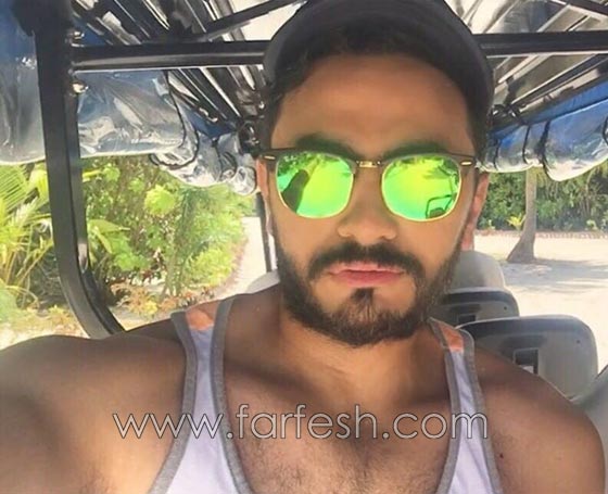 صور تامر حسني مع زوجته بسمة بوسيل على شواطئ المالديف صورة رقم 3