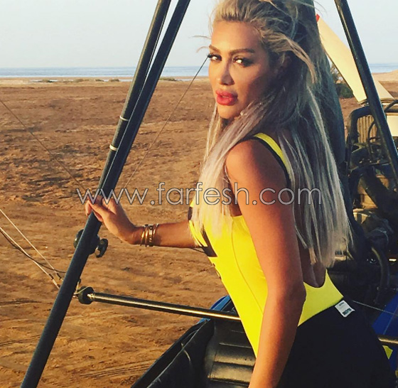 صور مايا دياب ترتدي (مايوه) وفوقه جاكيت طويل! صورة رقم 10