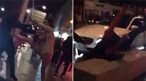  فيديو مرعب: امرأة حديدية تقضي على رجلين وتلقي بهما أرضا! صورة رقم 1