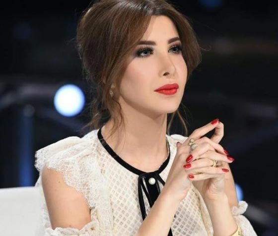نجمات العالم العربي تتنافس بلون أظافرهن صورة رقم 6