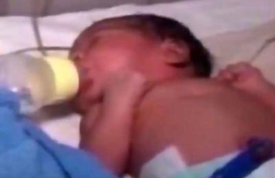  فيديو  إنقاذ رضيعة هندية بعد دفنها حية في مكب نفايات صورة رقم 2