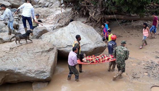 كولومبيا: مقتل 154 شخصاً نتيجة فيضانات وانهيار أرضي.. فيديو وصور صورة رقم 23