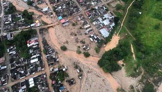 كولومبيا: مقتل 154 شخصاً نتيجة فيضانات وانهيار أرضي.. فيديو وصور صورة رقم 24