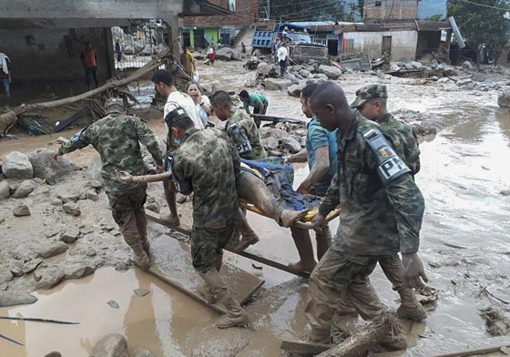 كولومبيا: مقتل 154 شخصاً نتيجة فيضانات وانهيار أرضي.. فيديو وصور صورة رقم 30