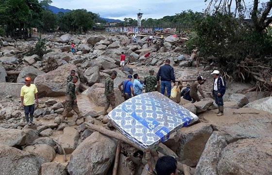 كولومبيا: مقتل 154 شخصاً نتيجة فيضانات وانهيار أرضي.. فيديو وصور صورة رقم 15