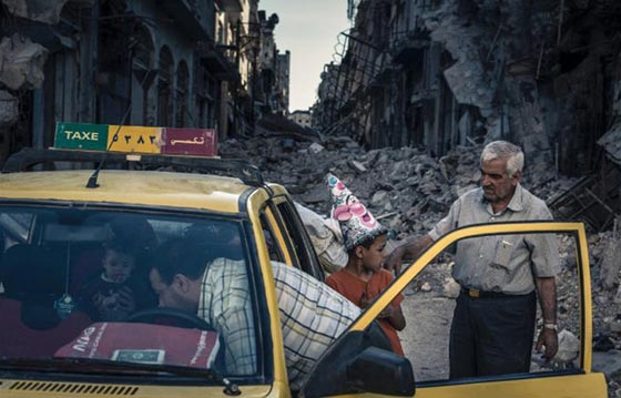 عدسة على سوريا.. معرض لمصور روسي يوثق اصعب حالات المعاناة في سوريا صورة رقم 3