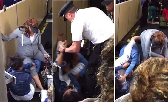 فيديو مثير.. طيار يتدخل لفض شجار بين امرأتين بالاعتداء على احداهن! صورة رقم 1