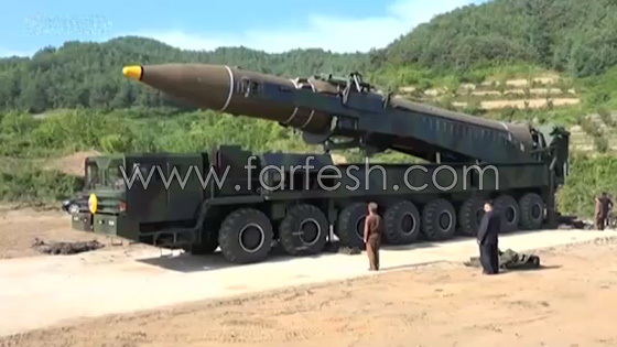 جونغ اون يتجول على بعد امتار من صاروخ اثناء اطلاقه وهو يدخن سيجارة صورة رقم 2