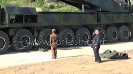 جونغ اون يتجول على بعد امتار من صاروخ اثناء اطلاقه وهو يدخن سيجارة صورة رقم 5