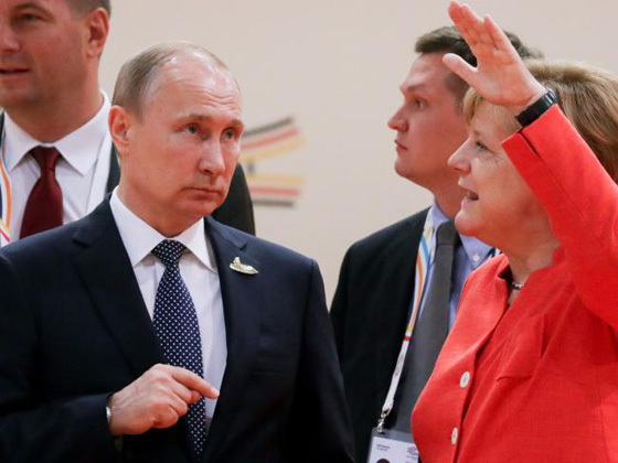 من يكشف سر الحديث الغاضب بين ميركل وبوتين في قمة العشرين؟ فيديو صورة رقم 2