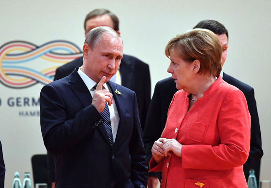 اول مصافحة بين ترامب وبوتين واتفاق على وقف النار فورا جنوب سوريا صورة رقم 13