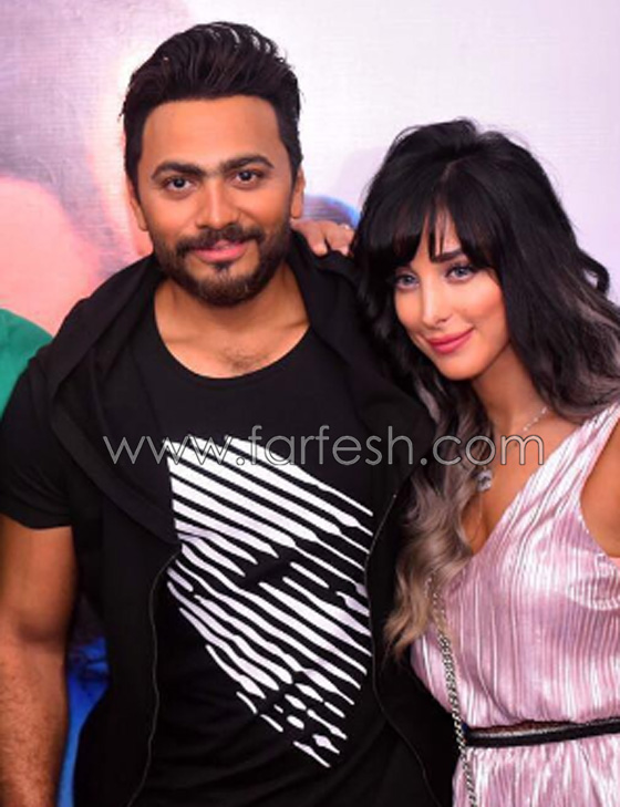 فيديو تامر حسني يعتذر لزوجته المغربية بسمة بوسيل على الهواء  صورة رقم 6
