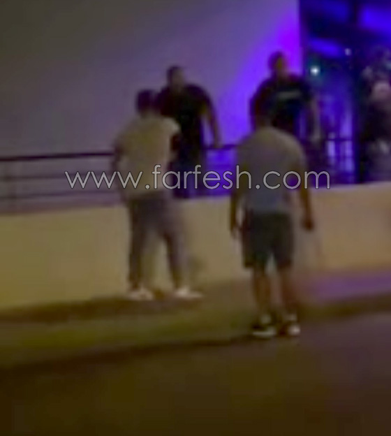 فيديو مثير.. حارس ملهى ليلي يعتدي على شاب لم يكف عن تهديده! صورة رقم 2