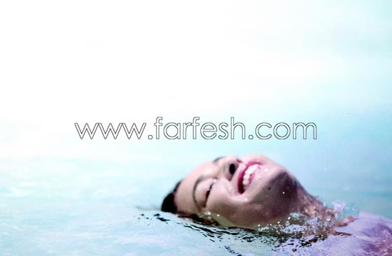 هند صبري تنافس نيللي كريم وتنشر صورها بالمايوه في البحر! صورة رقم 5