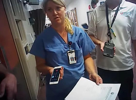 فيديو صادم.. شرطي يعتدي بوحشية على ممرضة وسط صراخها! صورة رقم 1