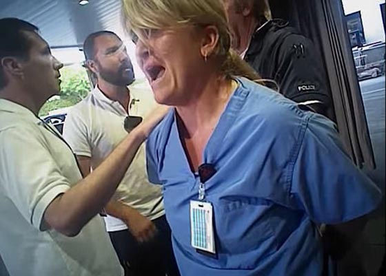 فيديو صادم.. شرطي يعتدي بوحشية على ممرضة وسط صراخها! صورة رقم 5