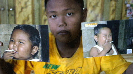 وباء قاتل.. اطفال مدمنين على التدخين في إندونيسيا  صورة رقم 2