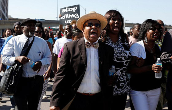 تخوف من اعمال شغب في ميزوري بعد تبرئة شرطي ابيض من قتل شاب اسود صورة رقم 17