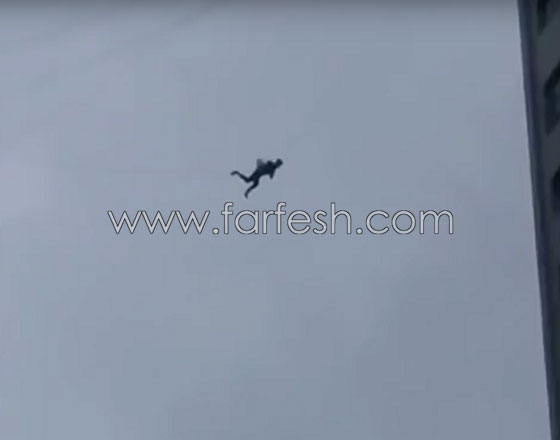 تعلق بكوابل الهاتف الهوائية هربا من دفع فاتورة الفندق! صورة رقم 1