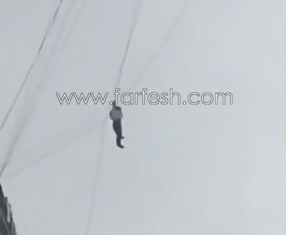 تعلق بكوابل الهاتف الهوائية هربا من دفع فاتورة الفندق! صورة رقم 2