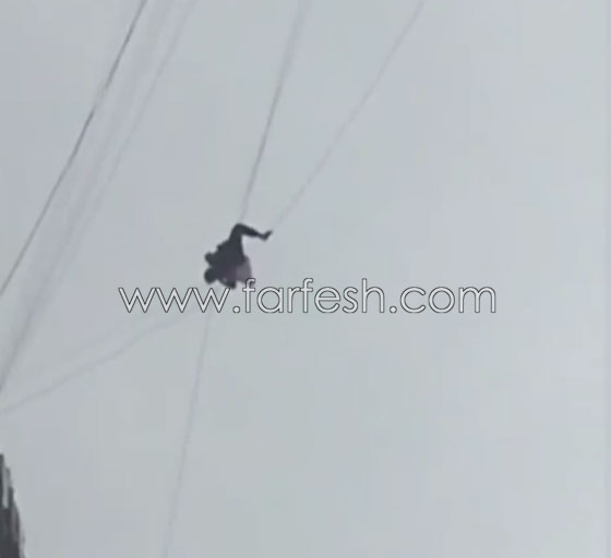 تعلق بكوابل الهاتف الهوائية هربا من دفع فاتورة الفندق! صورة رقم 5