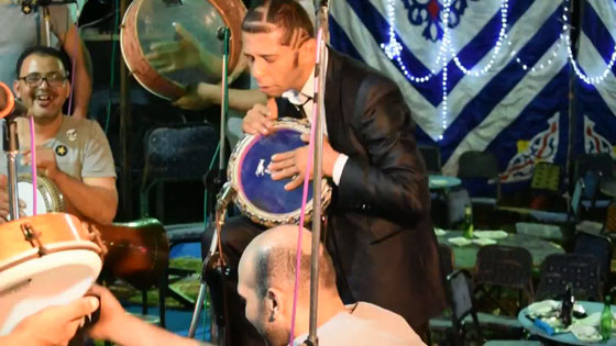 فيديو مؤلم: مصري معاق عقليا يستغلّوه في الافراح ليغني ويسخر منه الحضور! صورة رقم 7