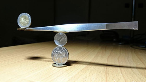 فيديو وصور.. فنان ياباني يتقن رص العملات بشكل معقد ومدهش! صورة رقم 2