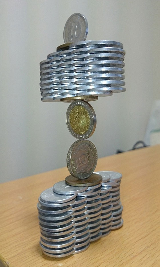 فيديو وصور.. فنان ياباني يتقن رص العملات بشكل معقد ومدهش! صورة رقم 6