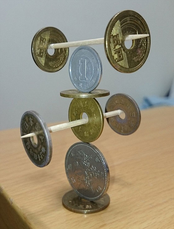 فيديو وصور.. فنان ياباني يتقن رص العملات بشكل معقد ومدهش! صورة رقم 4