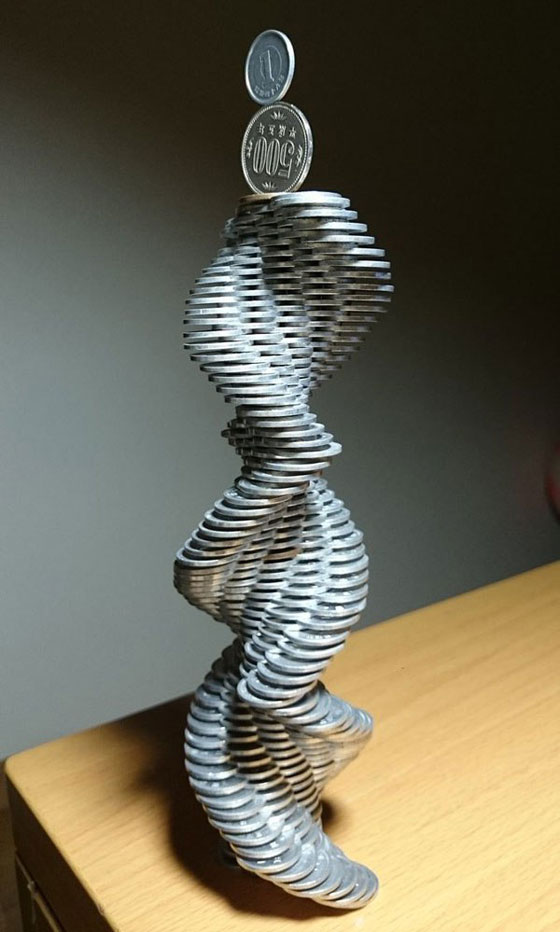 فيديو وصور.. فنان ياباني يتقن رص العملات بشكل معقد ومدهش! صورة رقم 11