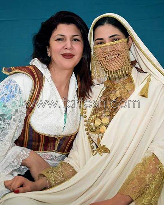صور فنانة تونسية بفستان زفاف جريء اثار الكثير من الجدل! صورة رقم 6