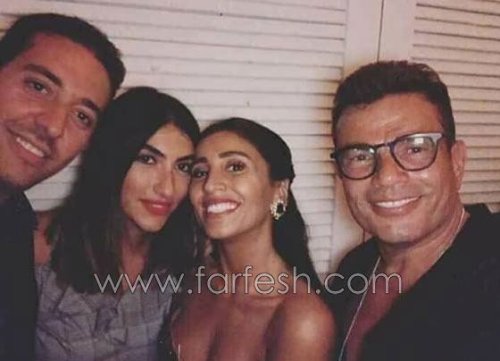 صورة عمرو دياب يمسك يد دينا الشربيني بمطار دبى تثير الجدل من جديد صورة رقم 3