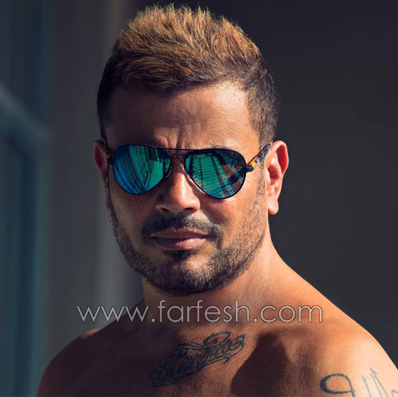 بالفيديو: عمرو دياب يعتدي على أحد حراسه لهذا السبب صورة رقم 11
