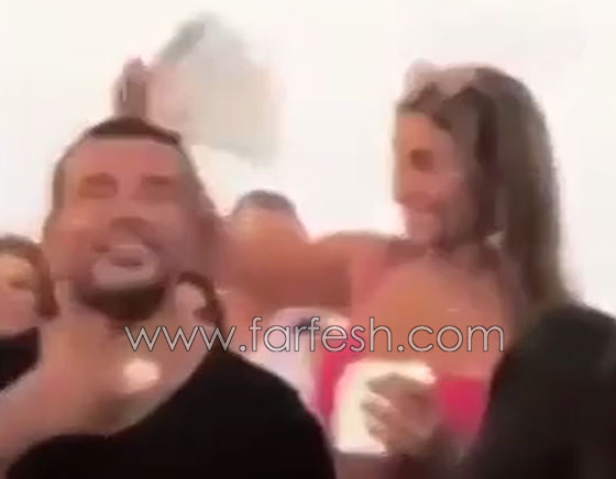ماذا فعلت دينا الشربيني لتخفف الحر عن الهضبة عمرو دياب في حفله الاخير؟ صورة رقم 2