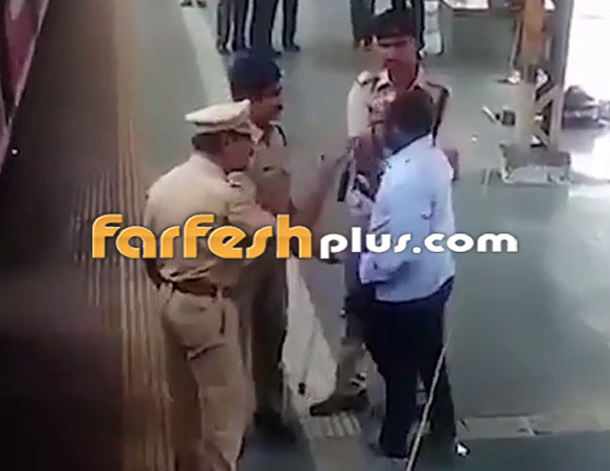 سرعة بديهة شرطي هندي تنقذ رجلا من الموت تحت عجلات قطار! صورة رقم 6