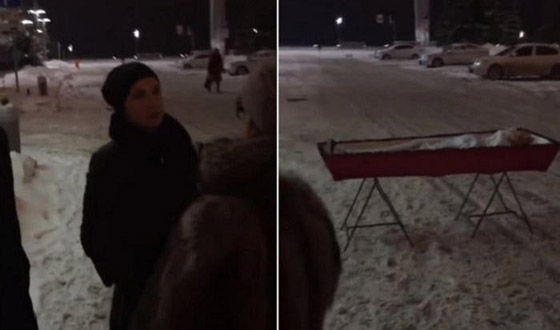 بالفيديو: سيدة روسية تضع تابوتاً فيه جثمان زوجها أمام مبنى حكومي.. والسبب؟  صورة رقم 4