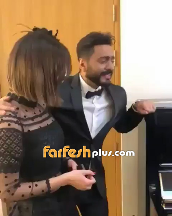 لحظة رومانسية تجمع النجم تامر حسني وزوجته بسمة بوسيل، بالفيديو صورة رقم 4