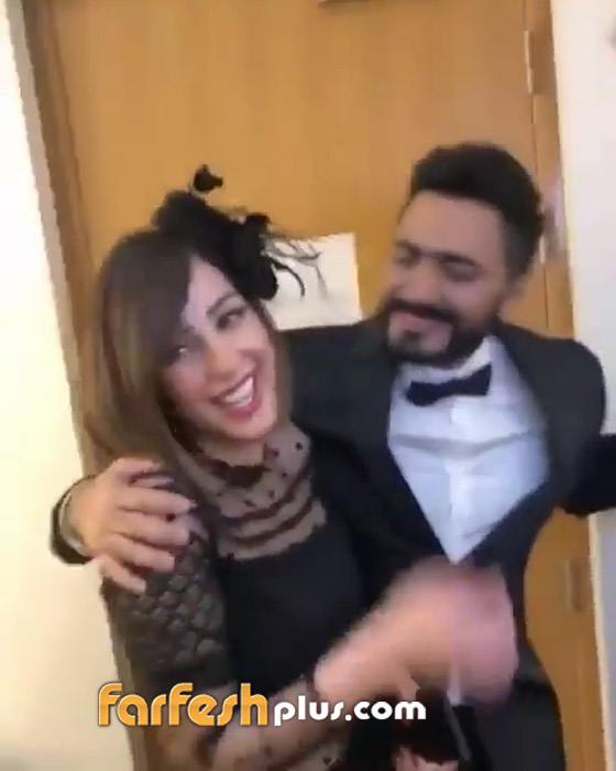 لحظة رومانسية تجمع النجم تامر حسني وزوجته بسمة بوسيل، بالفيديو صورة رقم 2