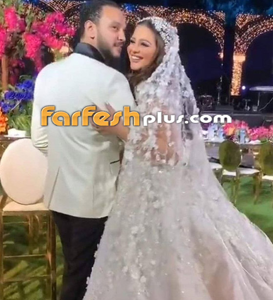 تفاصيل فستان زفاف هنادي مهنا الملكي: صُنع خصيصا لها بـ40 ألف وردة صورة رقم 23