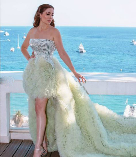 صور: نسرين طافش تخطف الأنظار بفستان راقي وأنيق في مهرجان كان السينمائي صورة رقم 10