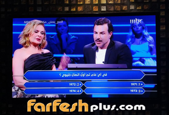 فيديو: سمية الخشاب وناصر القصبي يربحان المليون مع جورج قرداحي! صورة رقم 5