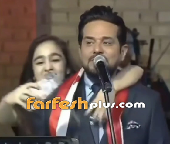 فيديو: فتاة تقتحم المسرح في حفل حاتم العراقي.. وهذه ردة فعله صورة رقم 1