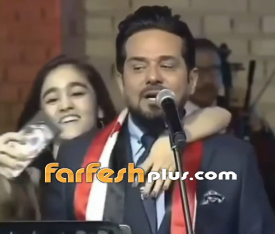 فيديو: فتاة تقتحم المسرح في حفل حاتم العراقي.. وهذه ردة فعله صورة رقم 6