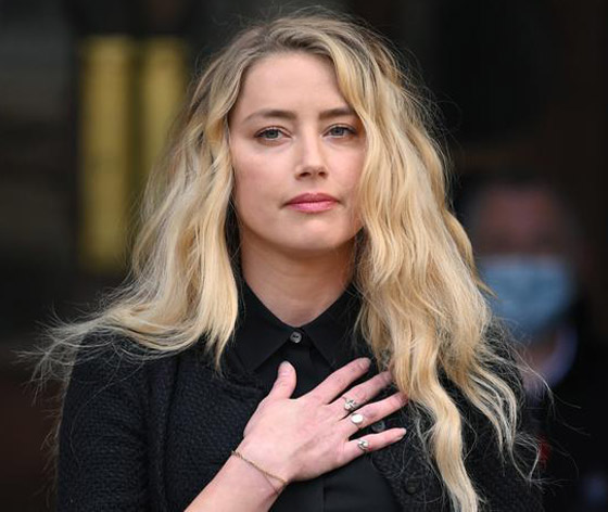 صور فضيحة آمبر هيرد: تُقبل عشيقتها عارضة الأزياء المثلية في مصعد! صورة رقم 15